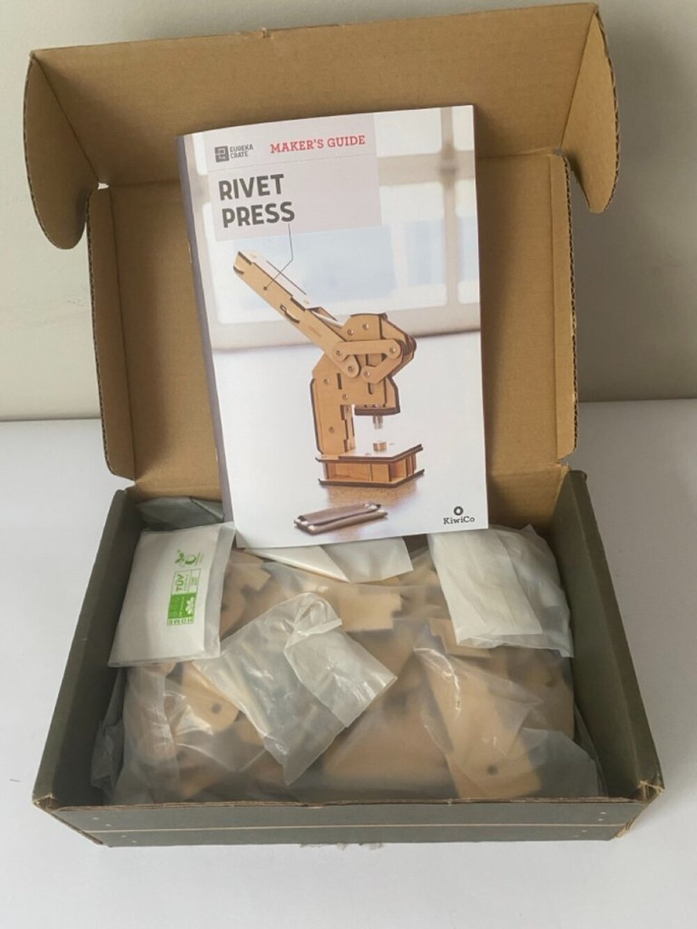 KiwiCo Rivet Press Eureka Crate build kit. Recommended ages 12+.